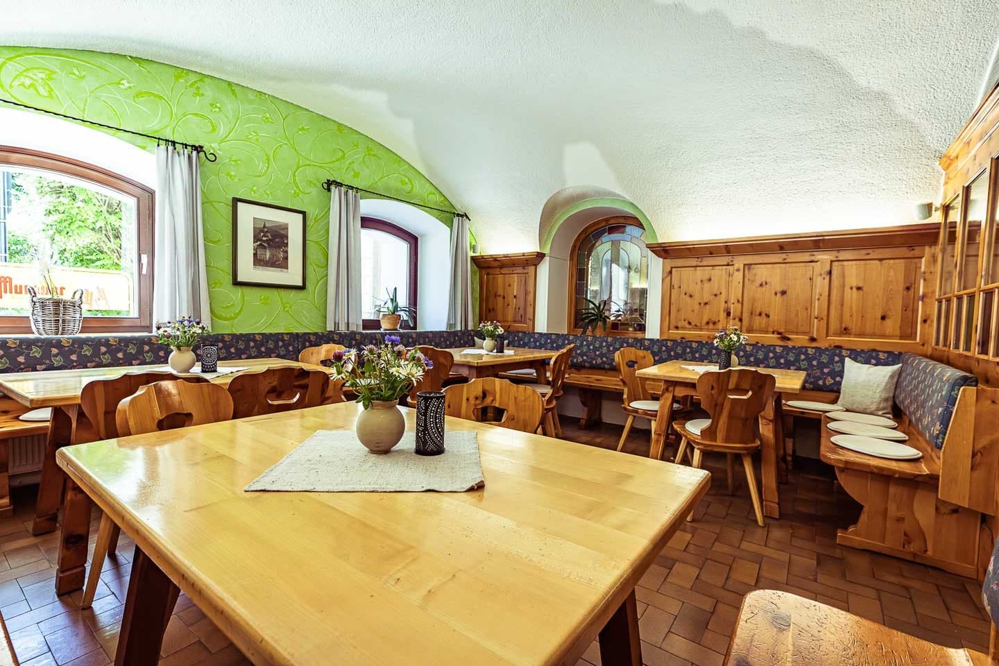 Dining room, light wooden tables