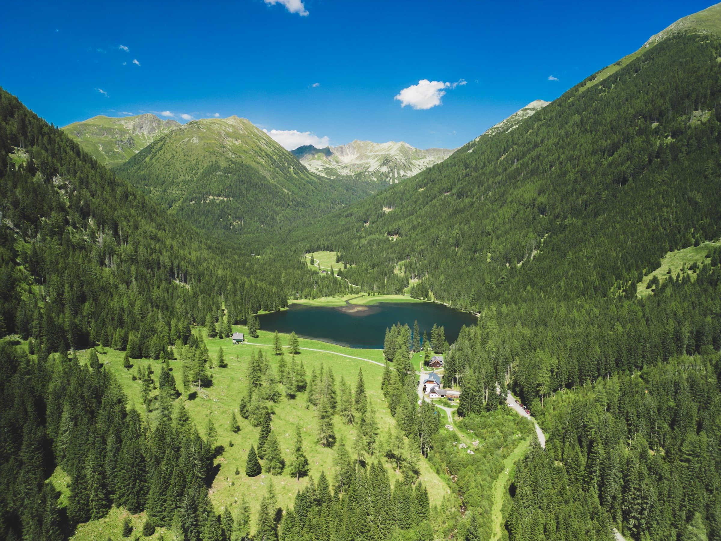 Mountains in summer, aerial view of Etrachsee in the valley