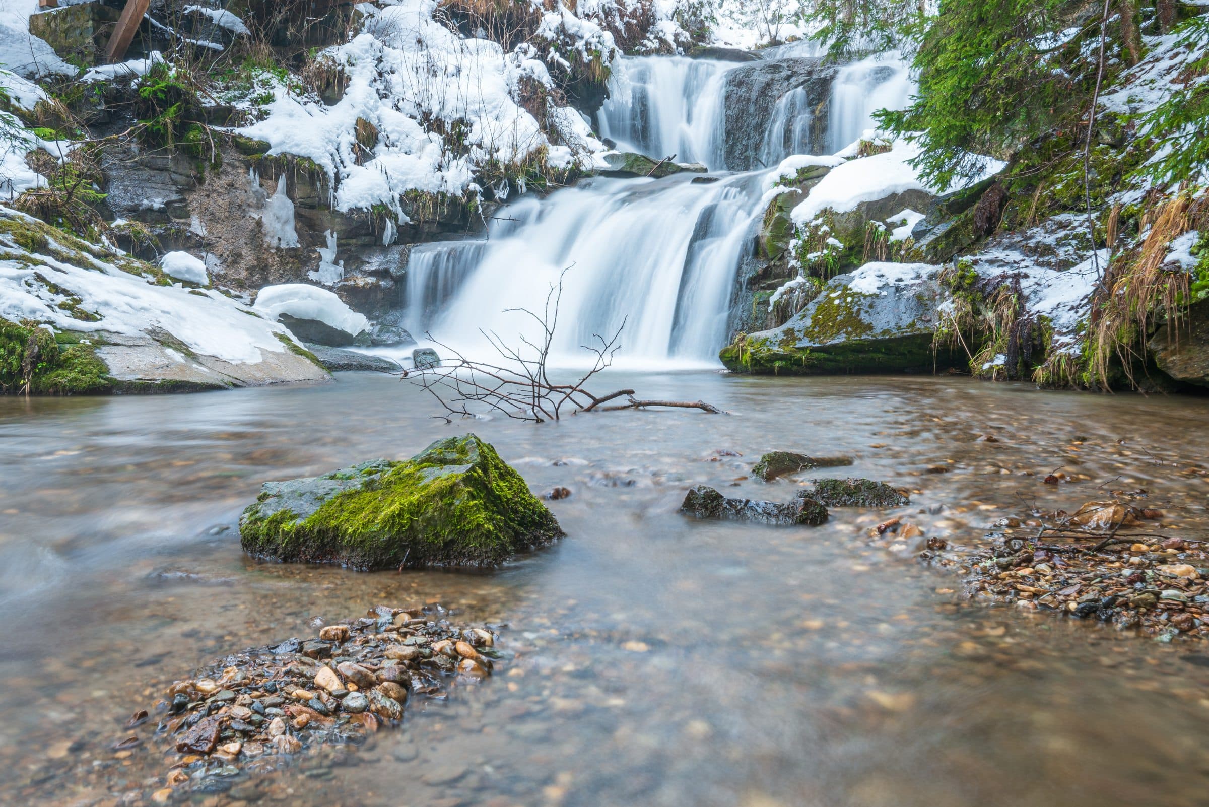 Winter landscape, waterfall in the winter forest, Graggerschlucht (landscape format)